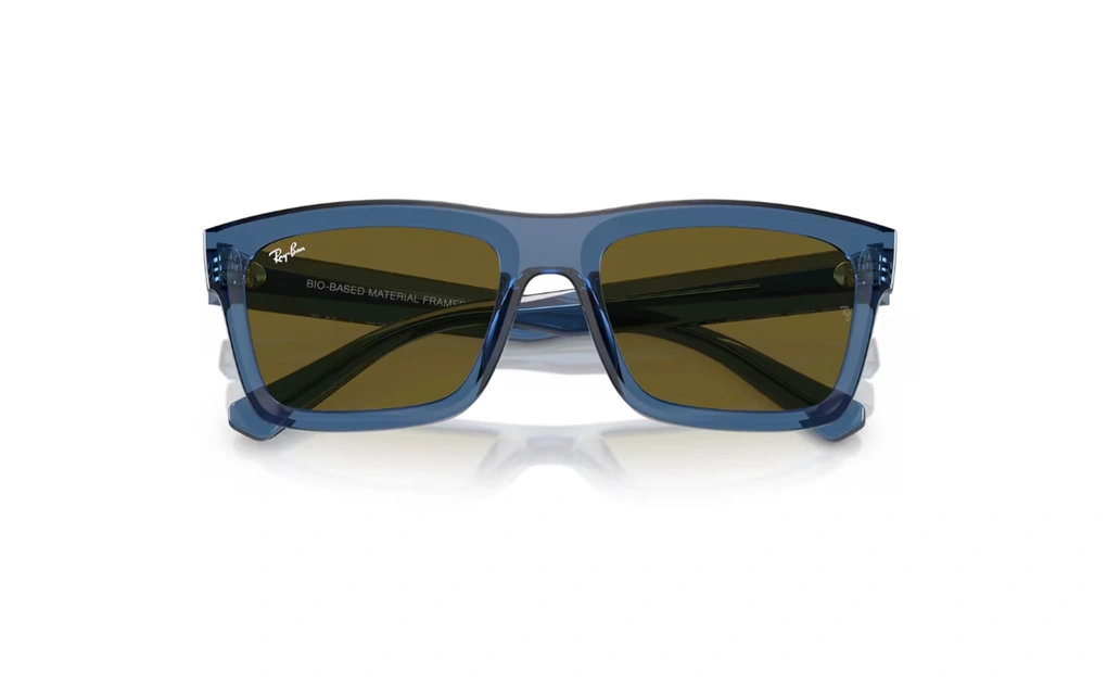 عینک آفتابی محیط زیستی ری بن فریم کائوچویی استات مربعی آبی شفاف به همراه عدسی قهوه ای - عکس از زاویه بسته عینک