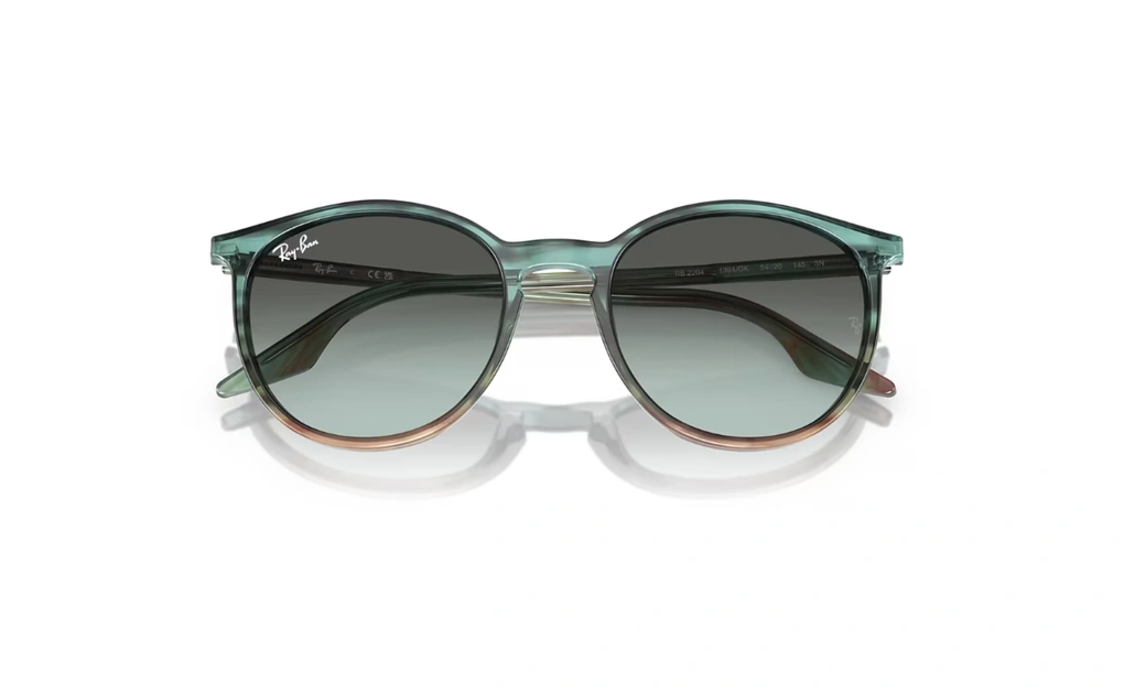 عینک آفتابی ری بن فریم کائوچویی استات به رنگ سبز آبی به همراه عدسی آبی سبز وینتیج - عکس از زاویه بسته عینک