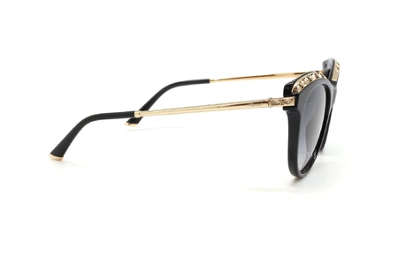 عینک آفتابی زنانه گربه ای شوپارد کائوچویی مشکی ابرویی طلایی نگین دار، عدسی دودی طیف دار - عکس از زاویه کنار