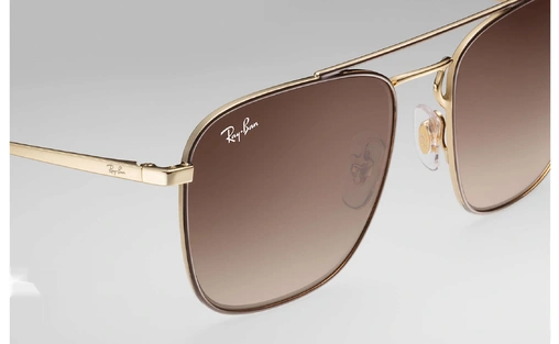 عینک آفتابی مربعی زاویه دار  ربین اصل - بدنه طلایی قهوه ای - عدسی قهوه ای - زاویه نزدیک