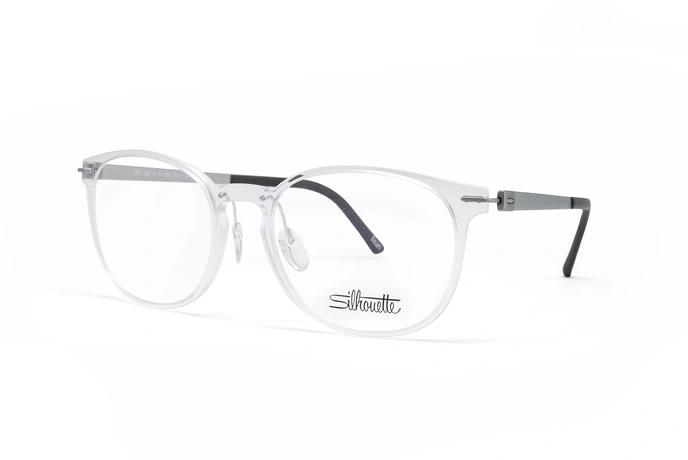 عینک طبی سیلوئت مدل SPX فریم دایره ای به زنگ شفافا و دسته های تیتانیومی - عکس از زاویه سه رخ
