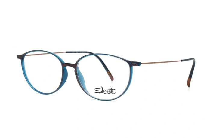 عینک طبی سیلوئت  SPX از بیرون قهوه ای و دور تا دور حدقه ها آبی به همراه دسته های تیتانیومی قهوه ای - عکس از زاویه سه‌رخ