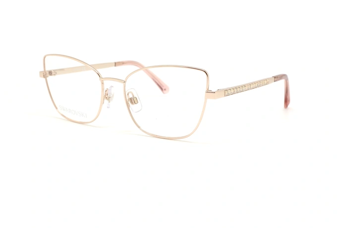 عینک طبی زنانه سواروسکی فریم فلزی گربه ای رنگ طلایی دسته ها نگین کاری شده - عکس از زاویه سه رخ