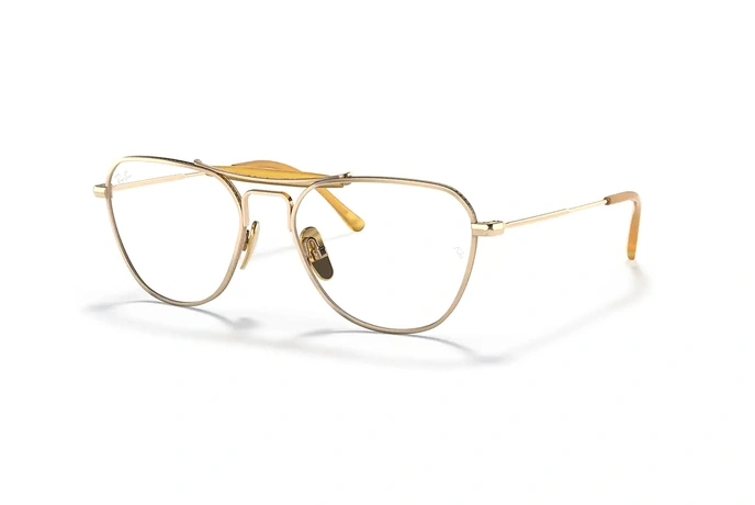عینک طبی ری بن فریم شبه خلبانی دو پل تیتانیوم رنگ طلایی و زرد، حدقه های نسبتا گربه ای - عکس از زاویه سه رخ