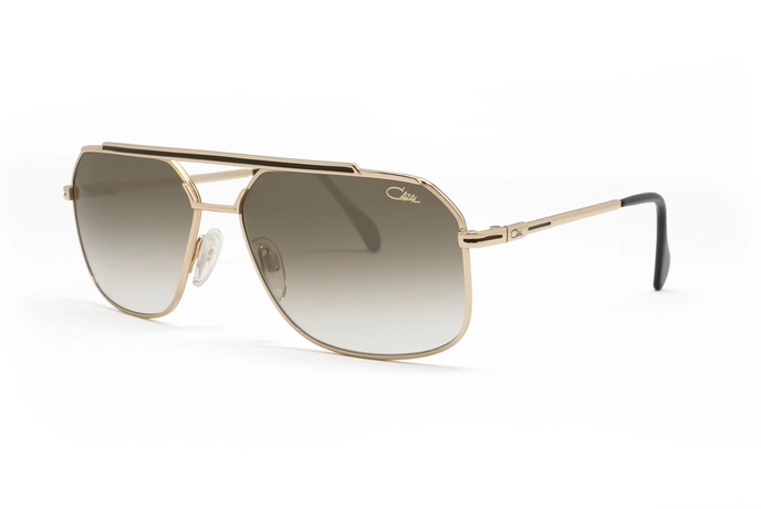 عینک آفتابی کازال Cazal با بدنه طلایی و عدسی قهوه‌ای طیف‌ دار - زاویه سه‌رخ