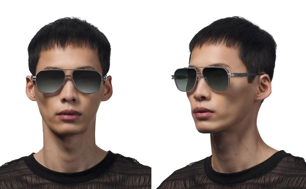 عینک آفتابی مردانه دیتا تیتانیومی با بدنه طلایی و عدسی دودی سایه روشن